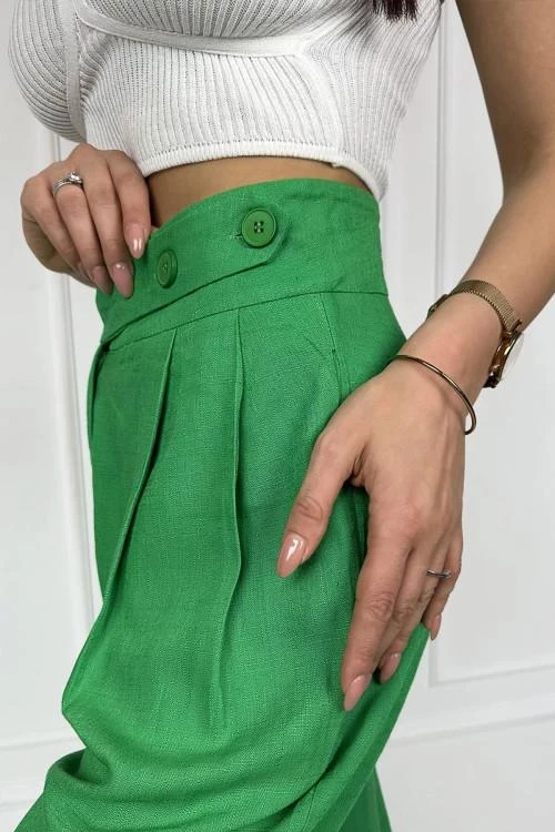 Ženske hlače z asimetričnimi gumbi